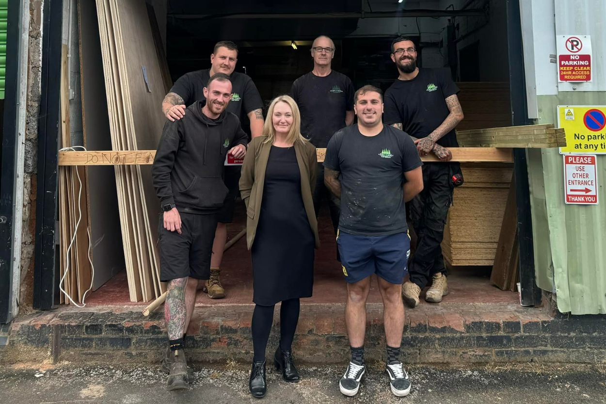 Jo Platt with Billy and the Leigh Timber team.