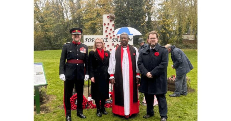 Jo - at a Remembrance Sunday event - alongside fellow MP Michael Wheeler.